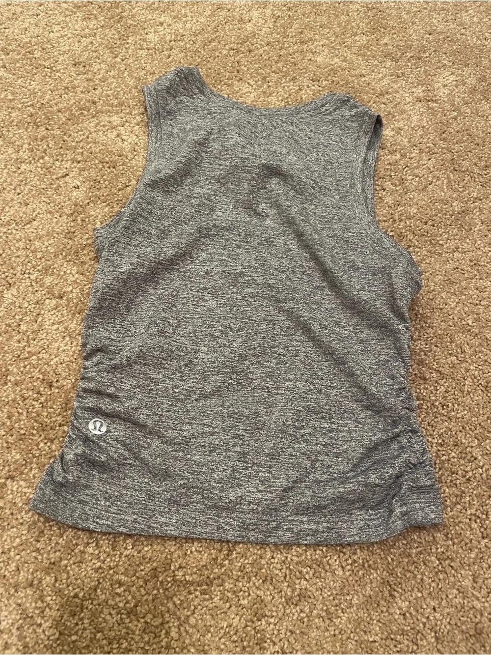 Lululemon License to Train Tight-Fit tank in heathered true navy color